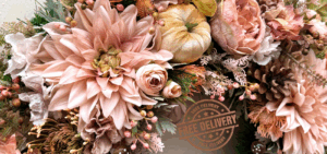 free delivery banner for jamesia blooms with picture of artificial wreath autumn bellini